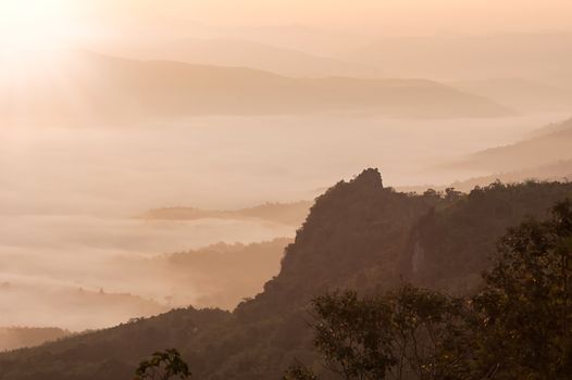 Beautiful morning with fog between hills at Doi Pha Chu in Si Nan National Park , High mountain in Nan province, Thailand