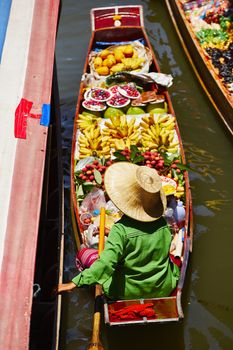 Traditional floating market in Damnoen Saduak near Bangkok