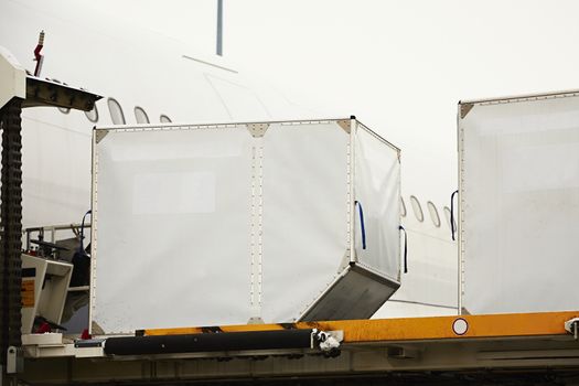 Loading of cargo to the commercial airplane.