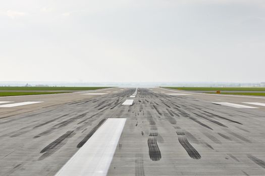 Airport - Striped line on the runway. 
