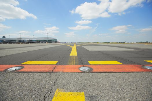 Airfield - marking on taxiway is heading to runway. 