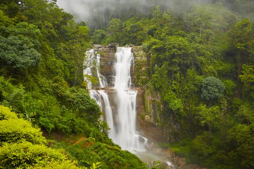 Waterfall in deep forest near Nuwara Eliya in Sri Lanka. 