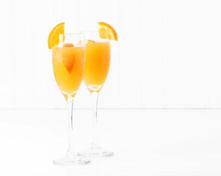 The cocktail known as a mimosa contains orange juice and champagne.