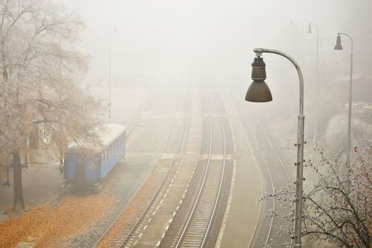Old railway station in thick fog, Prague, Czech Republic