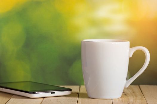 Coffee cup with outdoor background