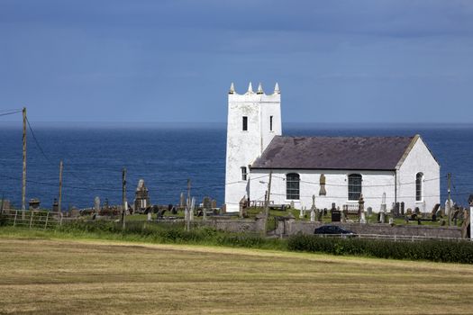 Ballintoy Parish Church is the main Church of Ireland church of the small town of Ballintoy, County Antrim, Northern Ireland. The church, is located a short distance from the town, close to the sea. Although there is no precise date of construction, it may be surmised that a place of worship was built on the present site at Ballintoy sometime during the first quarter of the seventeenth century.