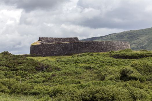 Cahergall Stone Fort near Cahirsiveen in southwest Ireland. This stone fort or Cashel was built as a protected farmstead. It is likely that someone of local importance lived here about a 1000 years ago.