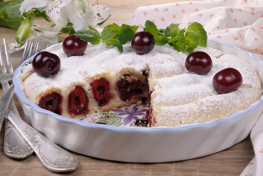 cherry pie pastry cut side under sugar powder