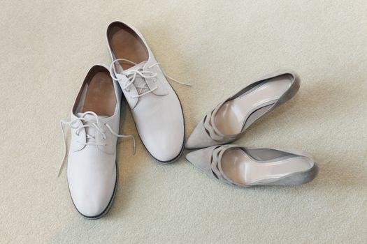 White shoes groom and beautiful bride's shoes