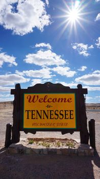 Welcome to Tennessee road sign with blue sky