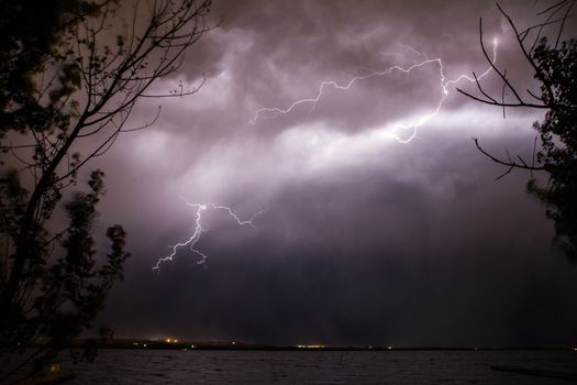lightning and thunder lighting up the night sky