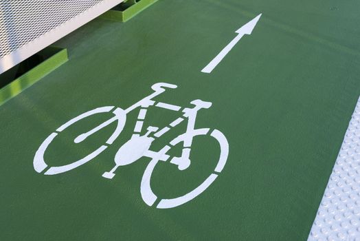 Bicycle road sign and arrow
