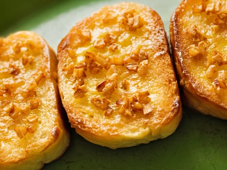 close up of rustic golden garlic toast bread