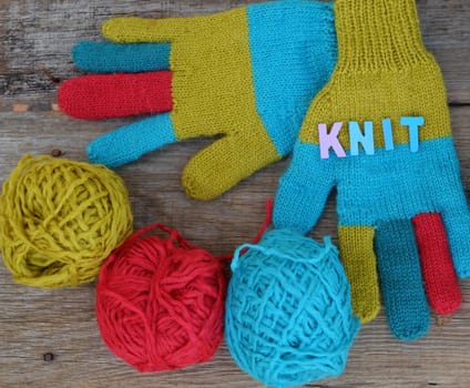 Abstract accessory for cold day in winter, colorful gloves make from leisure hobby in free time, handmade gift for mother day or valentine day