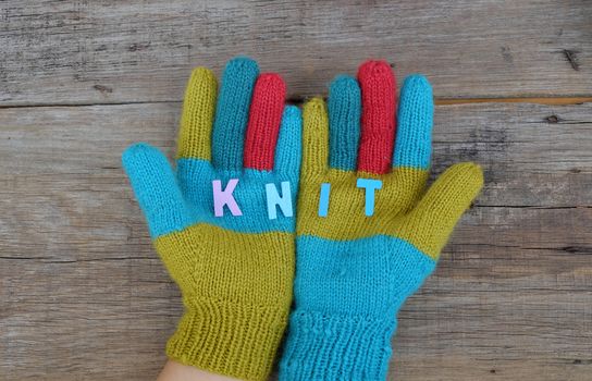 Abstract accessory for cold day in winter, colorful gloves make from leisure hobby in free time, handmade gift for mother day or valentine day