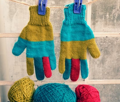 Abstract accessory for cold day in winter, colorful gloves make from leisure hobby in free time, handmade gift for mother day or valentine day