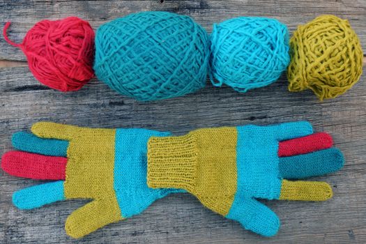 Abstract accessory for cold day in winter, colorful gloves make from leisure hobby in free time, handmade gift for mother day or valentine day