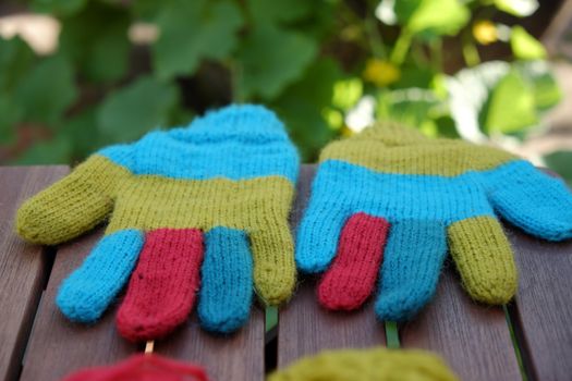 Abstract accessory for cold day in winter, colorful gloves make from leisure hobby in free time, handmade gift for mother day or valentine day