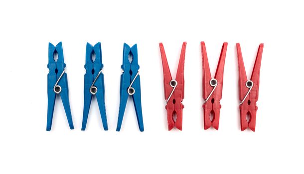 plastic clothes pegs on a white background