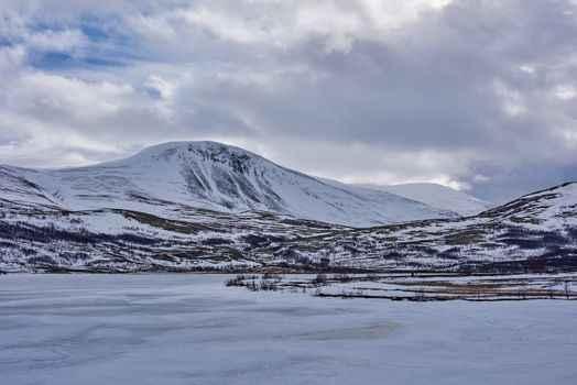 Mountains and landscape of Dovre, Norway at winter time.