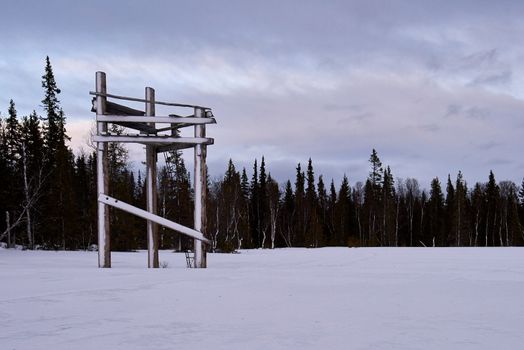 Hunting tower in the Swedish woods during wintertime. Used to hunt elk.