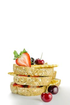 Whole wheat bread with mix berries  over white background