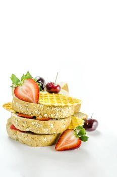 Whole wheat bread with mix berries  over white background