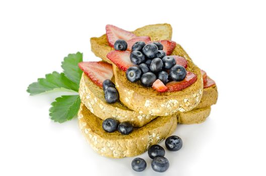 Whole wheat bread with mix berries fruit on white background