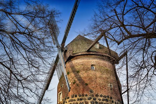 Old historic windmill in Zons am Rhein, Germany.