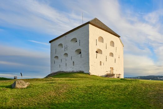 Kristiansten fortress in Trondheim Norway on a grassy hill at summertime.
