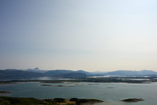 View of Norwegian sea and mountains in Helgeland, Norway.