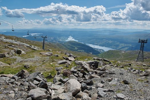 View of cable car lift, ski lift and paragliders at Åreskutan mountain, Åre, Sweden.