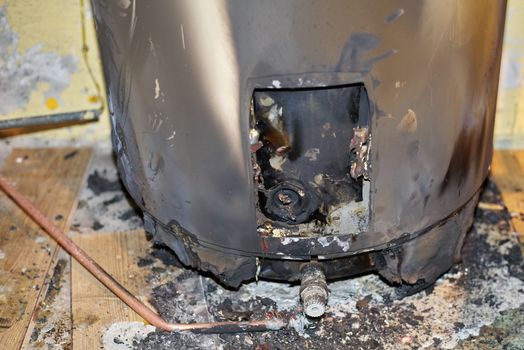Burned electrical connection in water heater. How it looks like after a fire.