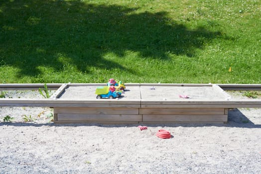 Sandbox with toys on top. Closeable.
