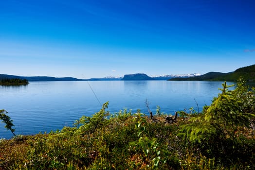 Water and Mountains view.