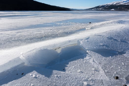Cracked ice on lake in Aare, Sweden.