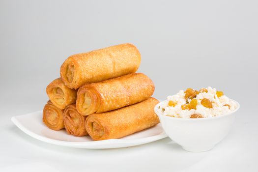 plate of crepes on ceramic plate. Shallow dof