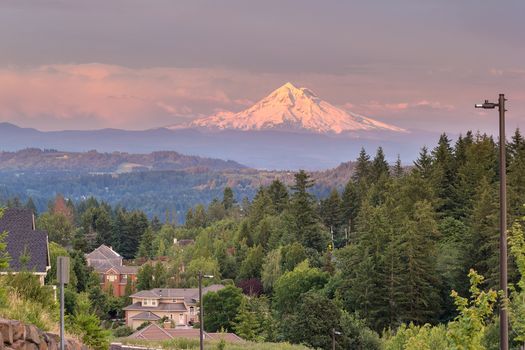Mount Hood evening alpenglow during sunset from Happy Valley Oregon residential neighborhood in Clackamas County