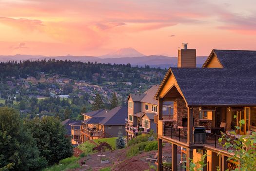 Sunset View with Mount St Helens from deck of luxury homes in Happy Valley Oregon in Clackamas County