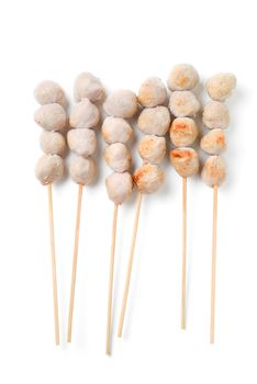 grill meatballs with bamboo skewer on white background