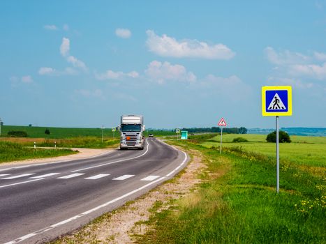 Zebra pedestrian crossing, drive truck cars on road