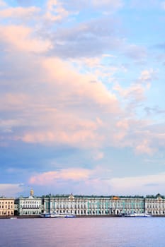 View of Winter Palace across Neva river at sunset, Saint Petersburg, Russia