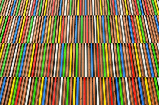 colored boards on the facade of the building in Leeds Dock