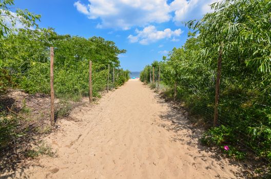 Path to sandy beach by Baltic sea in Sopot Poland.