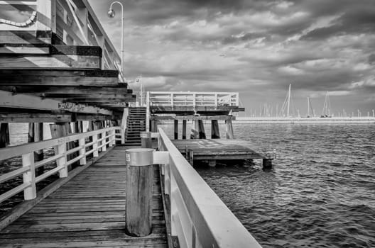 Black and white, HDR effect  pier during cloudy day in Sopot, Poland