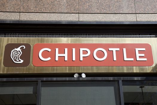 NEW YORK - AUGUST 16: Entrance to Chipotle Mexican grill in New York, United States America. 
An American chain of fast food restaurants with 2000 restaurants around the world.
Photo taken on: August 15th, 2016.


