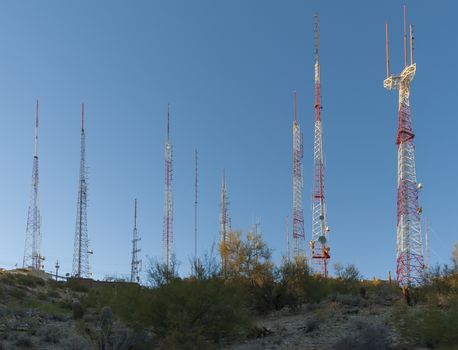 TV and radio transmitter towers on the top of the hill.