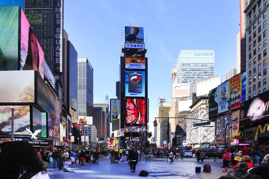 New York, USA - May 17, 2013: Times Square, featured with Broadway Theaters and huge number of LED signs, is a symbol of New York City and the United States, May 17, 2013 in Manhattan, New York City