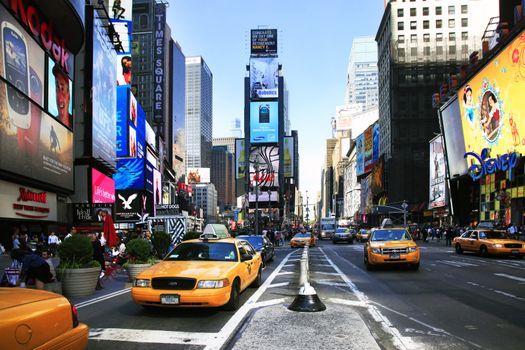 New York, NY, USA - May 17, 2013: Times Square, featured with Broadway Theaters and huge number of LED signs, is a symbol of New York City and the United States, May 17, 2013 in Manhattan, New York City