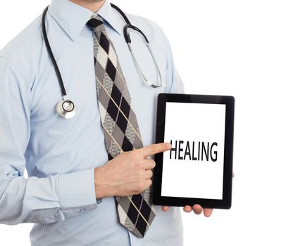 Doctor, isolated on white backgroun,  holding digital tablet - Healing